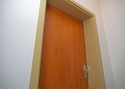 ADLO - Bezpečnostní dveře Teduo, povrch dveří Olše, obložková zárubeň hloubka 25 cm, RAL 1001