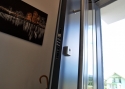 ADLO - Bezpečnostní Termo dveře Tesim, prosklené PS370, atyp madlo, povrch dveří RAL 7015